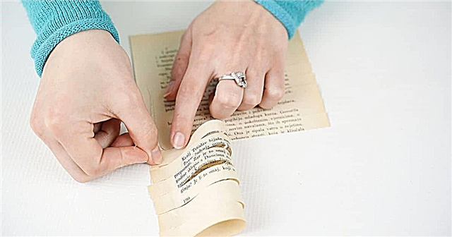 Венац од лепих ролни од папира направљен од старих страница књига